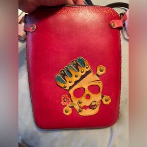 Pink Leather Crossbody Bag with Skull Design